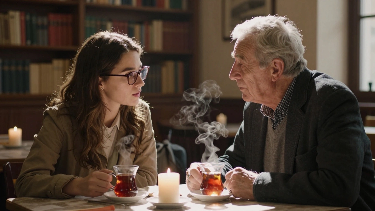 A young woman listens attentively to an older man during a candlelit dinner.